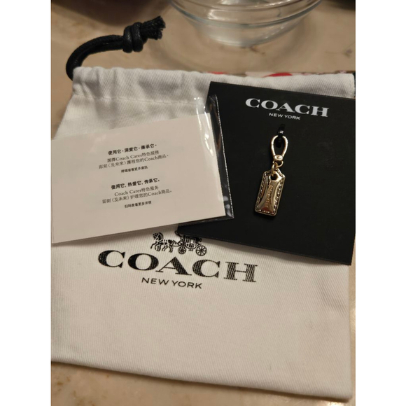 NWT Coach Gold Stitched Hangtag charm - Picture 1 of 6